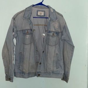 Blue ripped jean jacket